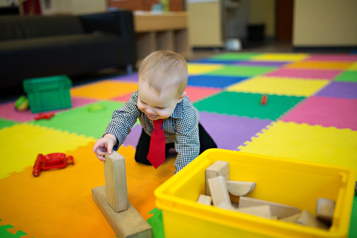 Cute Infant Playing in Daycare